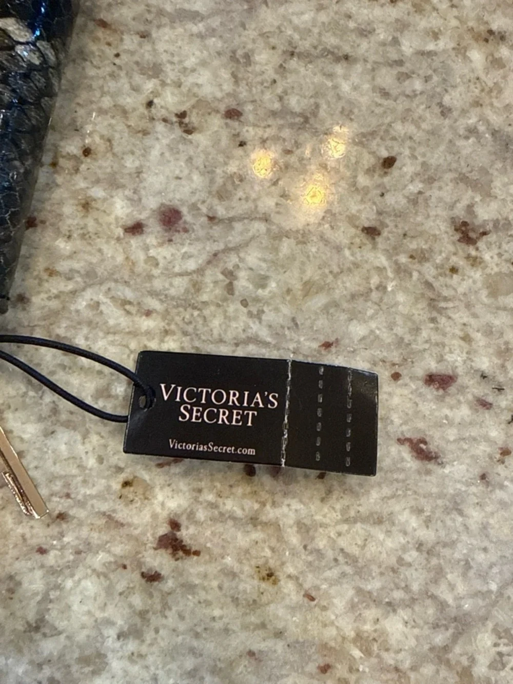 Victoria’s Secret Snake-Embossed Zip Wallet in Black and Taupe